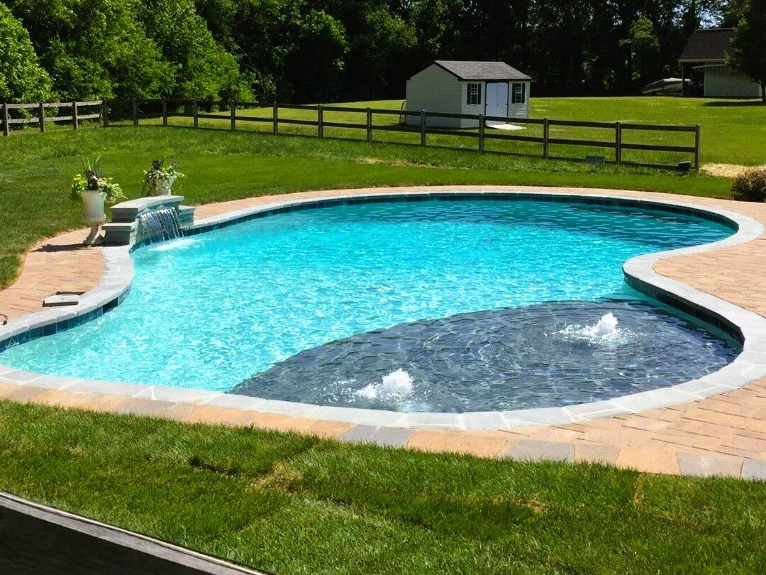 free-form-pool-with-fountains-and-waterfall