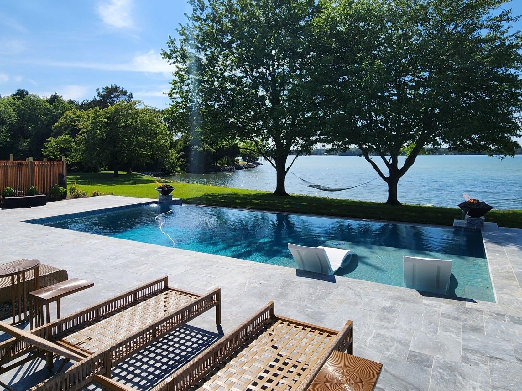 geometric-pool-with-fire-features-and-tanning-ledge