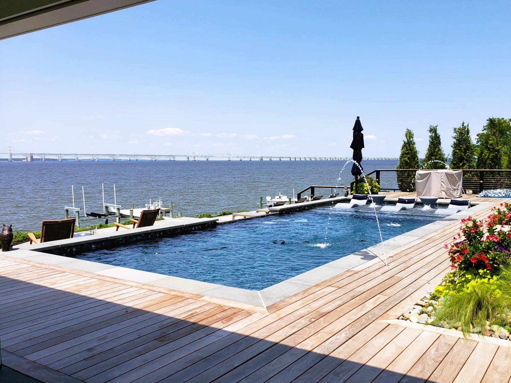 geometric-pool-with-tanning-ledge-and-water-features-1