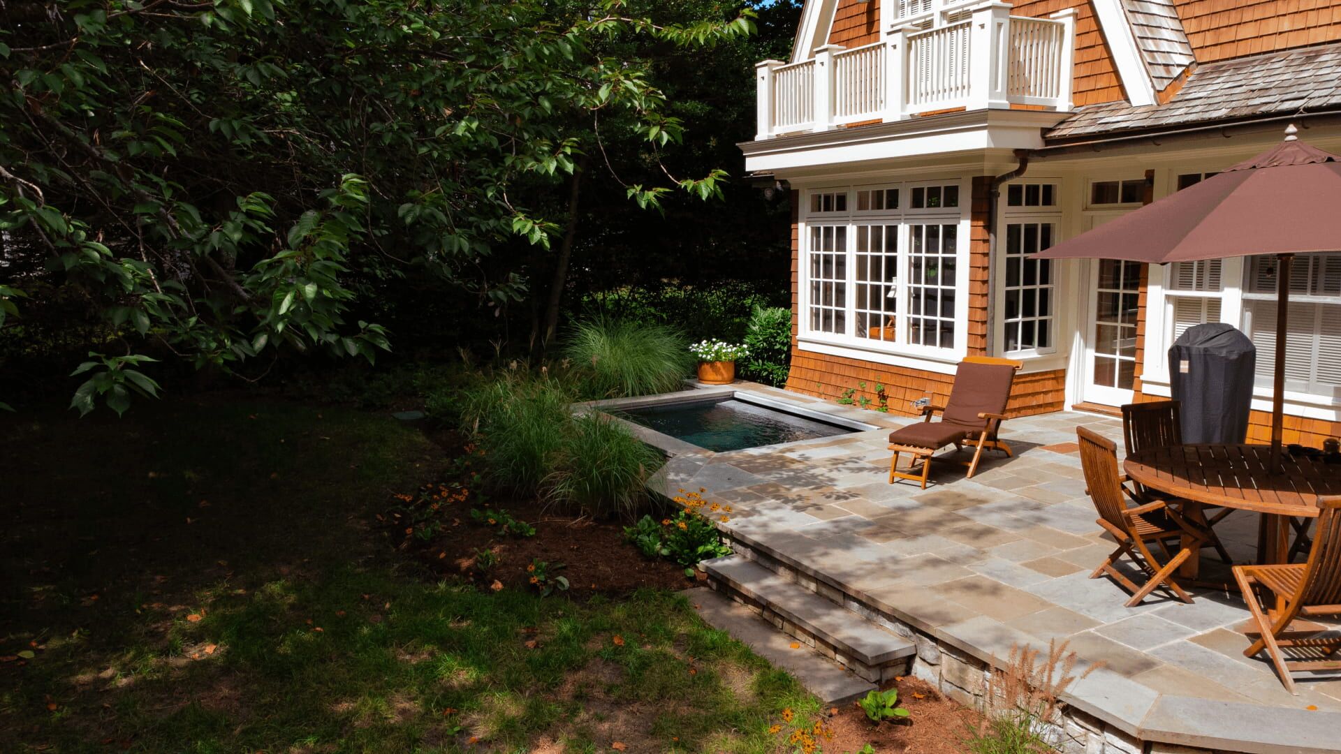 custom plunge pool with custom tiled pool deck