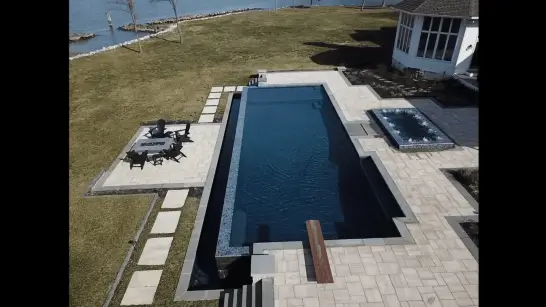 Overhead photo of an Infinity Edge Pool and Spa built by Coastal Pools in Maryland