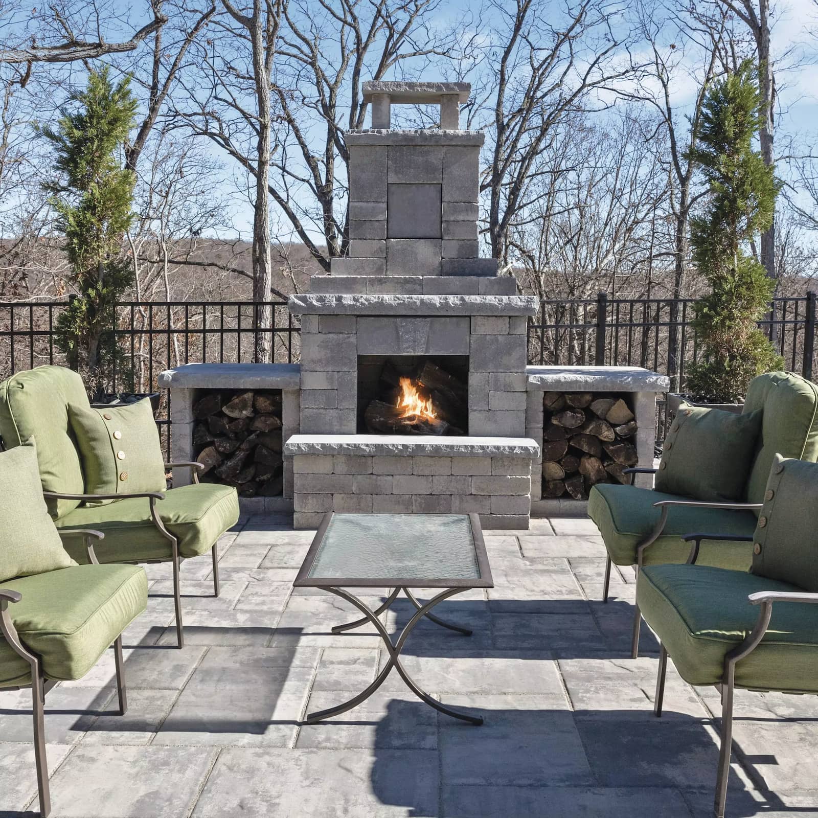 outdoor fireplace with wood storage
