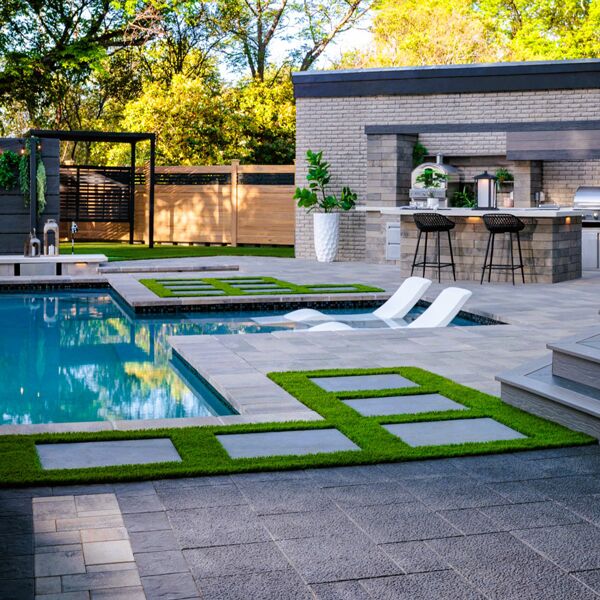 custom pool with outdoor kitchen